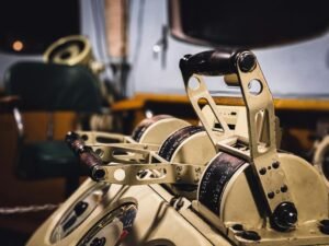 Close-up of vintage ship control levers inside a nautical cabin in Murmansk, Russia.